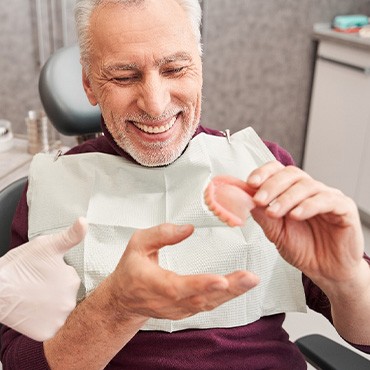 A man getting dentures made at the dentist