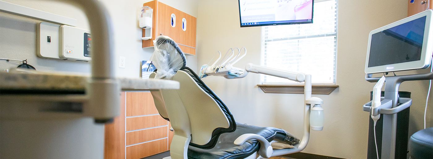 Dental treatment room equipped with advanced dental technology in Grapevine