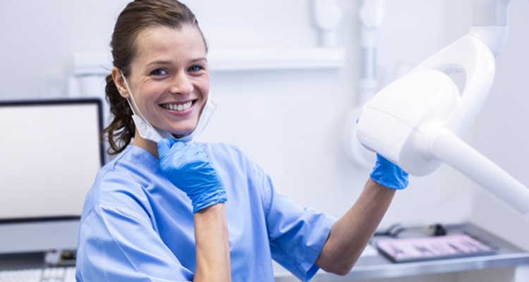 Dental hygienist smiles