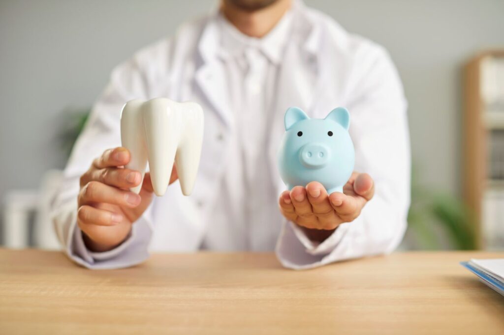 An AI image of a dentist holding a model of a tooth and a piggy bank